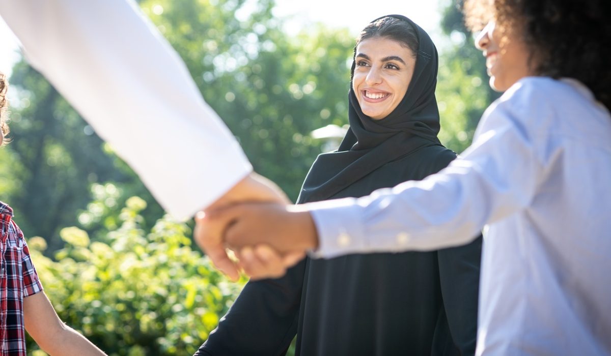 Cinematic image of a family from the emirates spending time at t Cinematic image of a family from the emirates spending time at the park